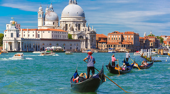 Picturesque view of Gondolas on Canal Grande with Basilica di Santa Maria della Salute in the background, Venice, Italy